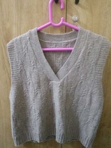 Knitted beige vest