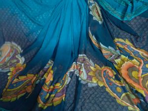 printed blue chiffon saree looks so aligned