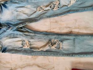 Ripped Light Wash Denim Jeans