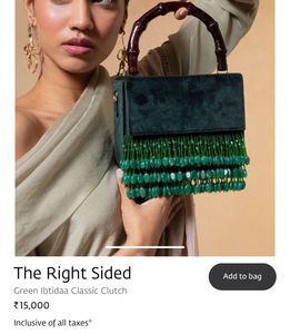 Elegant Green Suede Bag with Bamboo Handle
