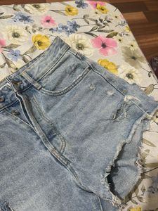 Light Wash Distressed Denim Shorts