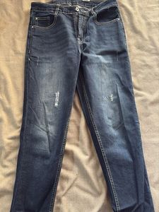 Distressed Blue Denim Jeans