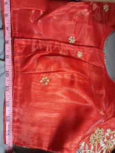 Red blouse with golden and pearl ambroidery