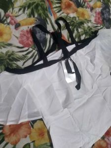 White Ruffle Top with Black Accents