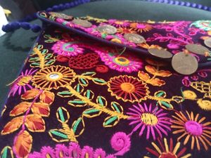 Embroidered Sling Bag.