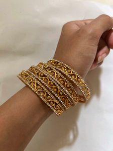 Elegant Gold Tone Bangle Set