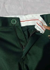fitted dark green trousers (unisex)