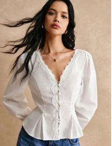 Elegant White Lace Trimmed Peplum Top
