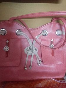 Stylish Pink Handbag with Drawstring Detail