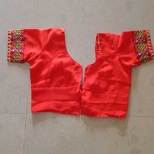Vibrant Orange Embroidered Saree