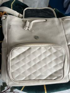 Cream Quilted Backpack including free delivery