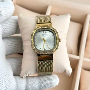 Gold Guess Watch with Crystal Bezel