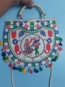 Embroidered Clutch with Tassels