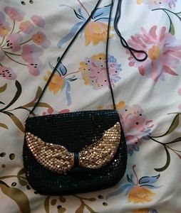 Sparkly Black Clutch with Gold Bow