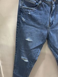Distressed Blue Denim Jeans