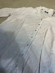 blue and white shirt with short sleeves