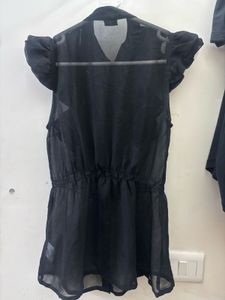 Chic Black Ruffled Sleeveless Top