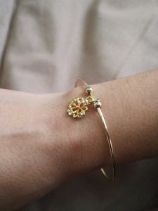 Gold Tone Flower Bangle