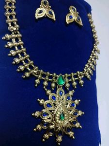 Golden Jewellery Set With Green Blue Stones