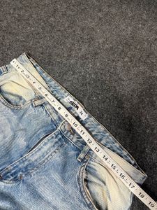 lite used blue baggy jeans