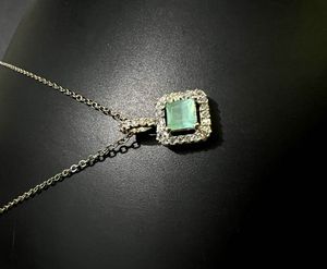 Elegant Emerald & Diamond Pendant Necklace