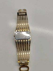 Elegant Gold Tone Watch with Rhinestones