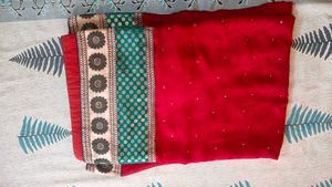 red designer saree with big border