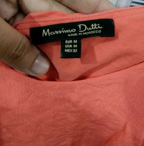 Coral coloured chic and elegant top