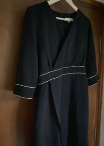 Elegant Black Wrap Dress with White Trim