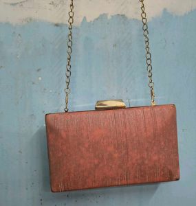 Elegant Peach Clutch with Gold Chain