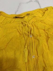 yellow blouson top