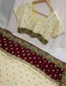 Elegant Cream & Maroon Embroidered Saree