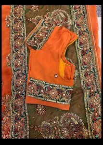 Exquisite Orange Embroidered Saree