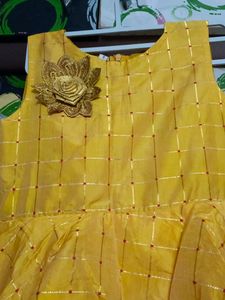 Vibrant Yellow Dress with Golden Flower