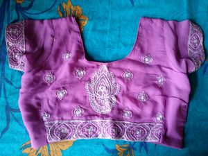 Georgette saree eith blouse..border and design...Pink in colour..