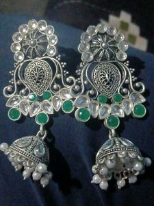 Elegant Jhumka Earrings with Green Stones