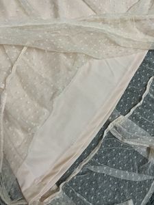 Lace midi skirt with ruffle detail