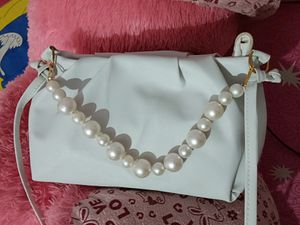 Material: PU    No. of Compartments: 1     Pattern: Printed     Net Quantity (N): 1     Sizes:Free Size (Length Size: 9 in, Width Size: 5 in, Height Size: 6 in).   Country of Origin: India