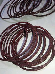 Set of Maroon Bangles with Gold Embellishments