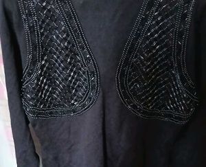 Elegant Black Beaded Statement Blouse
