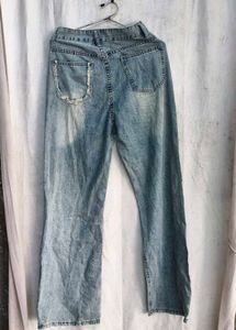 I. Light Wash Ripped Jeans