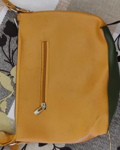 Jimmy Choo Mustard Sling Bag: Chic Style Statement