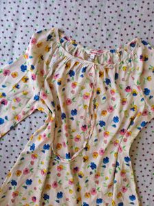 Floral top with Red Dhoti Pants