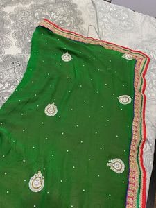 Elegant Heavy Green And Pink Embellished Saree