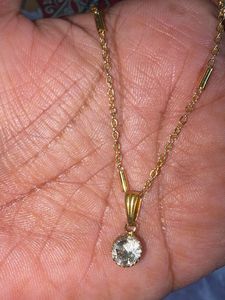 Elegant Gold Necklace with Crystal Pendant