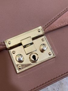 beige sling bag