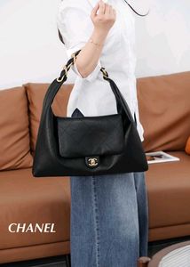 Chanel Maxi CC Hobo crafted in supple calfskin wit