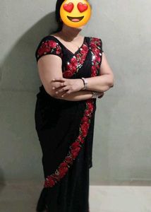 Elegant Black Saree with Red Floral Embroidery