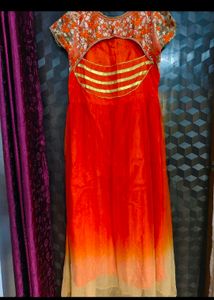Elegant Orange Embroidered partywear Gown