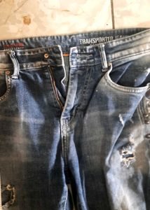 Distressed Blue Jeans